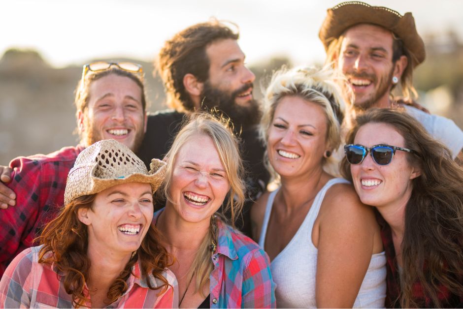 Group of adults outside smiling